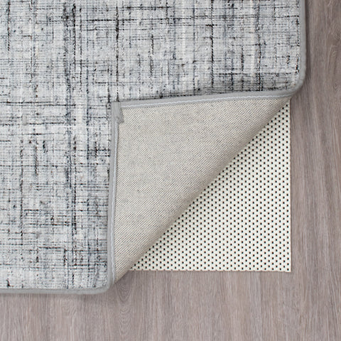 Non-skid waffle area rug pad. Cut to fit your area rug here in New England