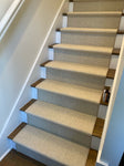 Elegance carpet shown as stair runner and highlighting its Hollywood install style 